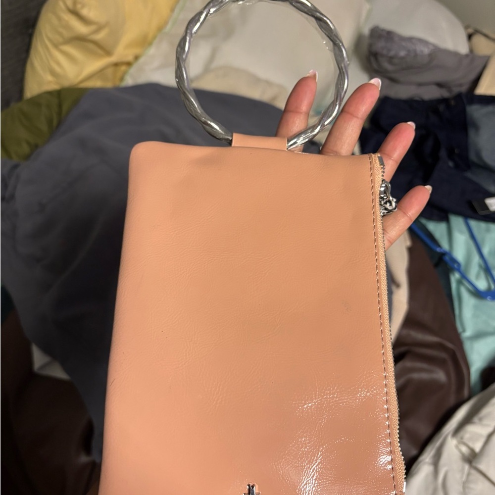 Elegant Peach Handbag with Silver Handle